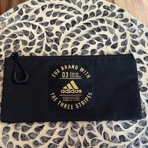 Adidas Black Pouch with Gold Accents